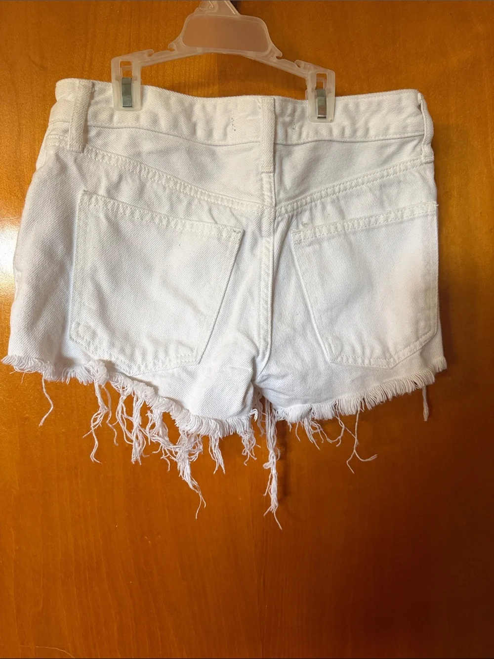 We The Free White Frayed Hem Denim Cutoff Shorts